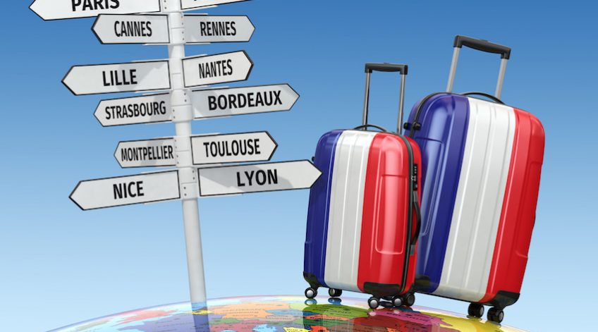 Travel concept. Suitcases and signpost what to visit in France. 3d